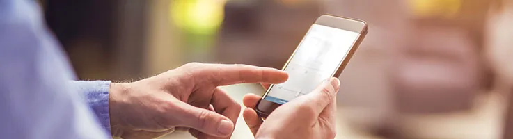 person using app for smart home technology