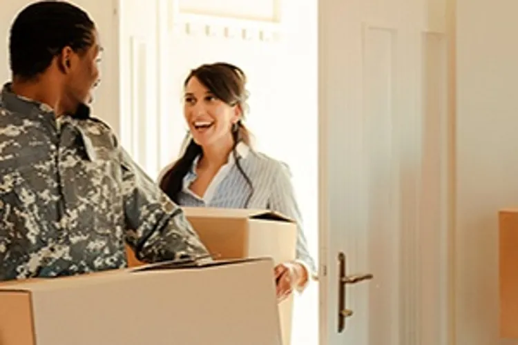 veteran moving box with woman