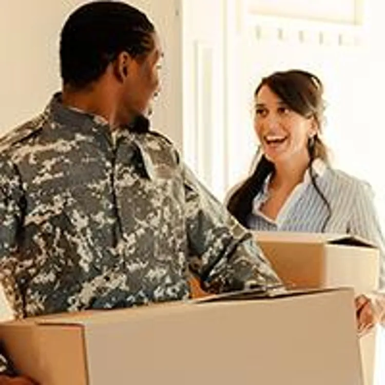 veteran moving box with woman