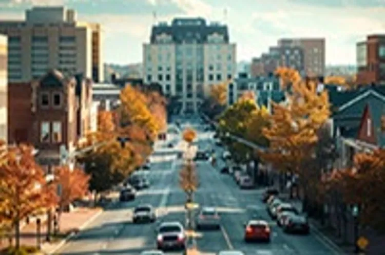 cityscape showing mid-rise buildings along a road