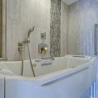 contemporary bathroom design with walk-in bathtub and safety features