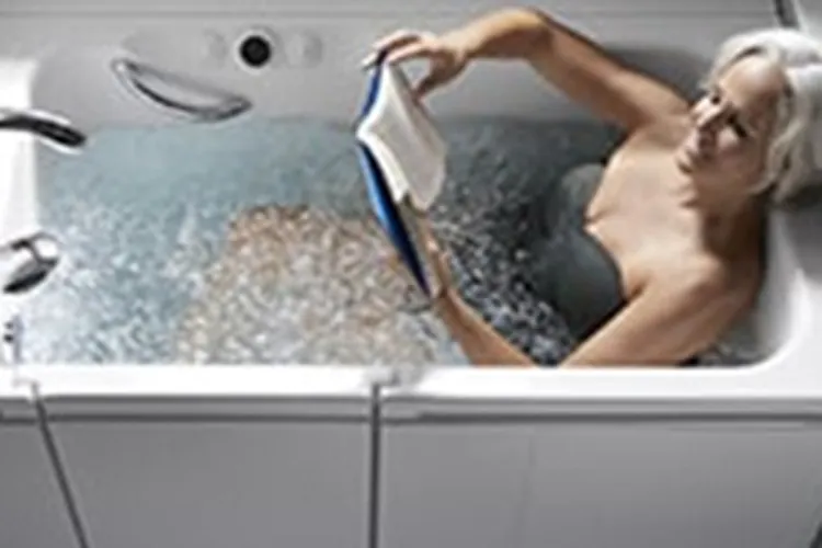 woman relaxing in her walk in bathtub