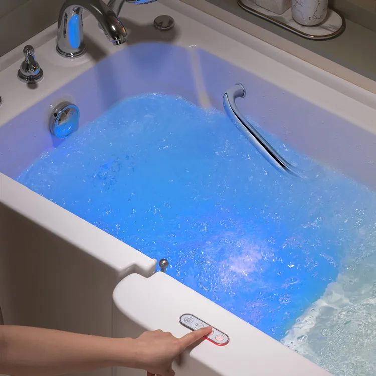 A walk-in bathtub with blue-lit water and a person pressing the control panel.