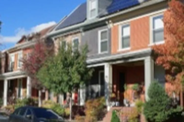 a nice washington dc home with solar panels on the roof