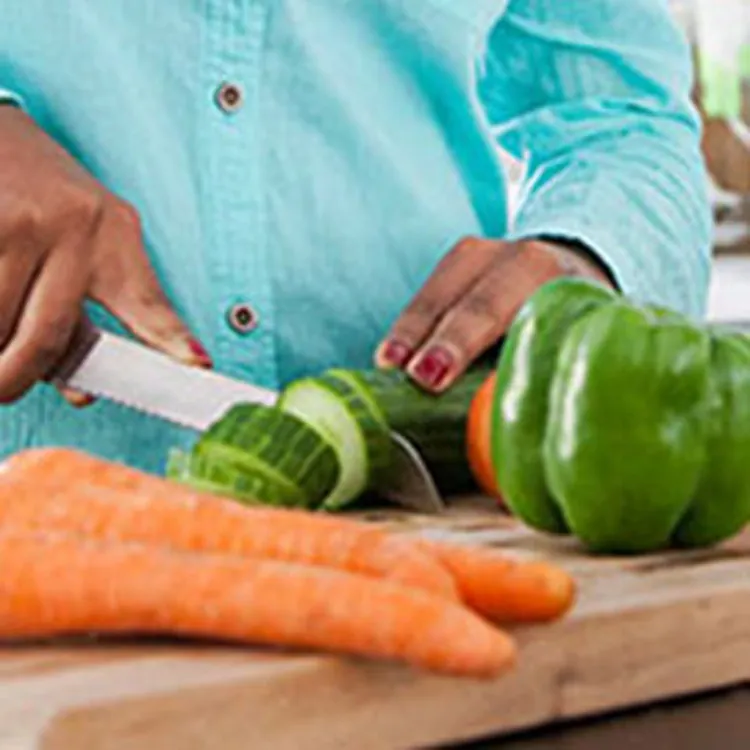 woman chopping vegetables