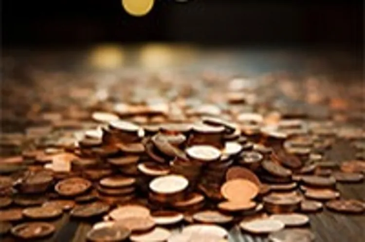 a stack of pennies on a table