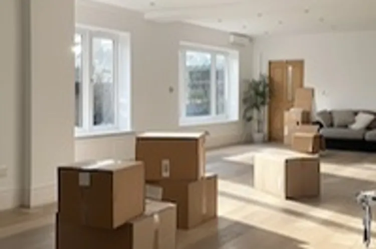 some moving boxes in a room