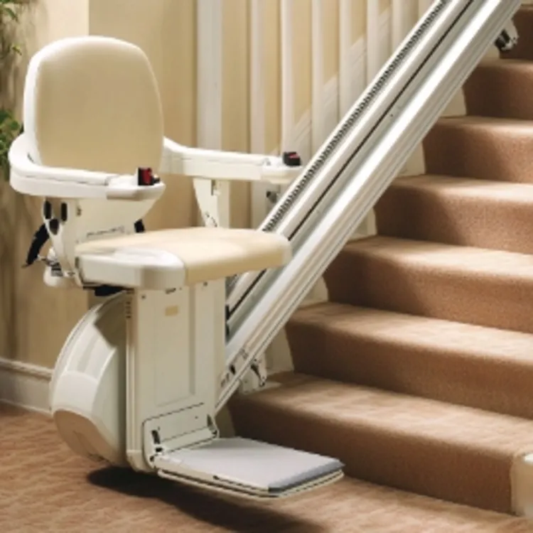 a stair lift at the bottom of stairs