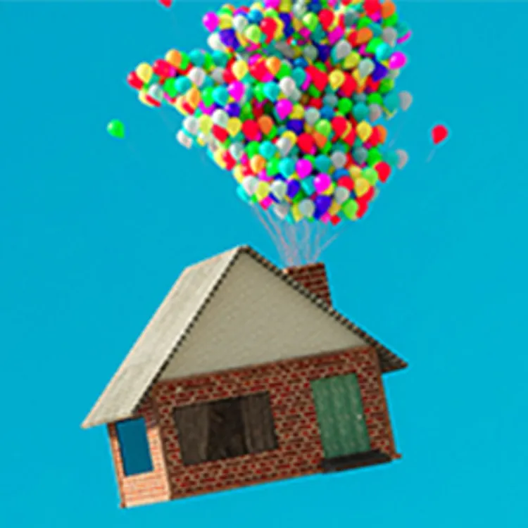 house with balloons tied to it floating through the sky