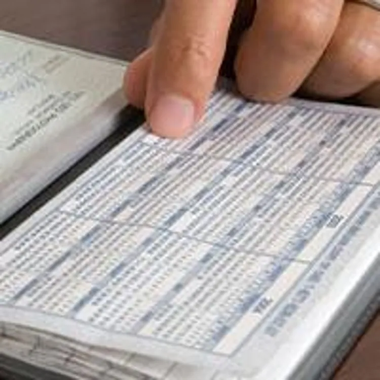 man writing a check
