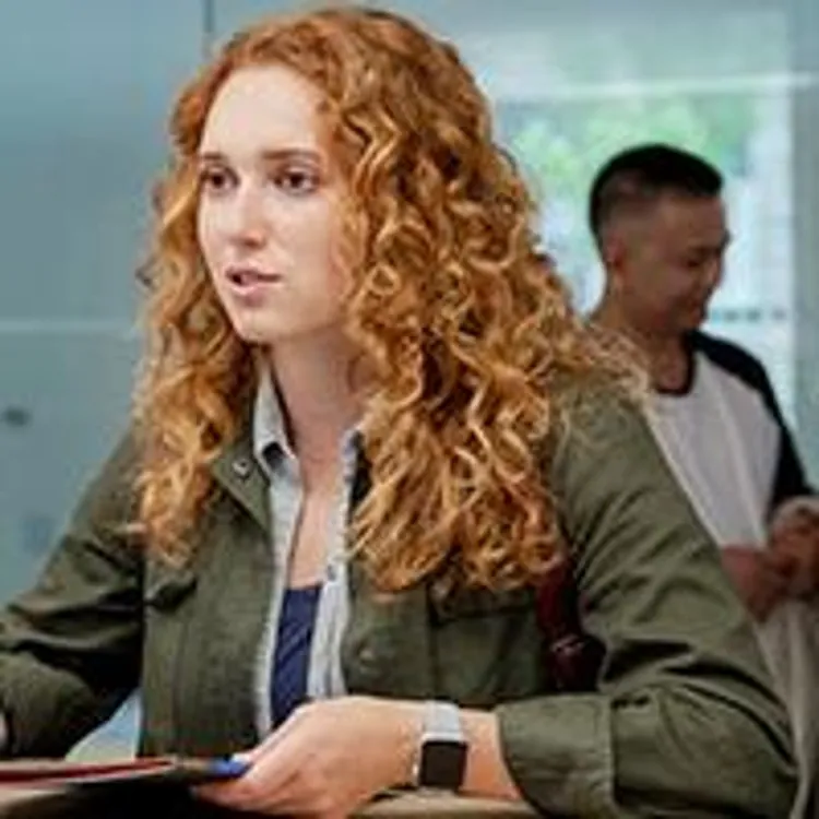 woman talking to a bank teller