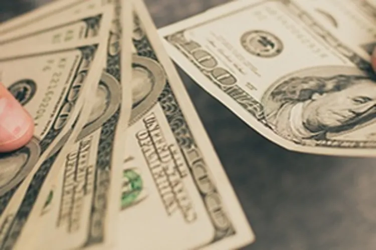 man holding money
