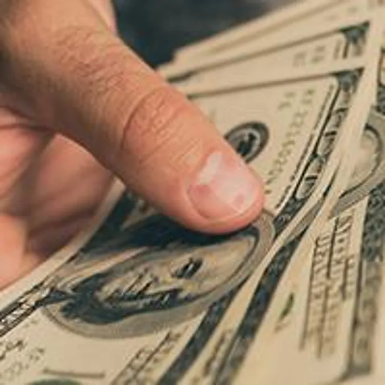 man holding money