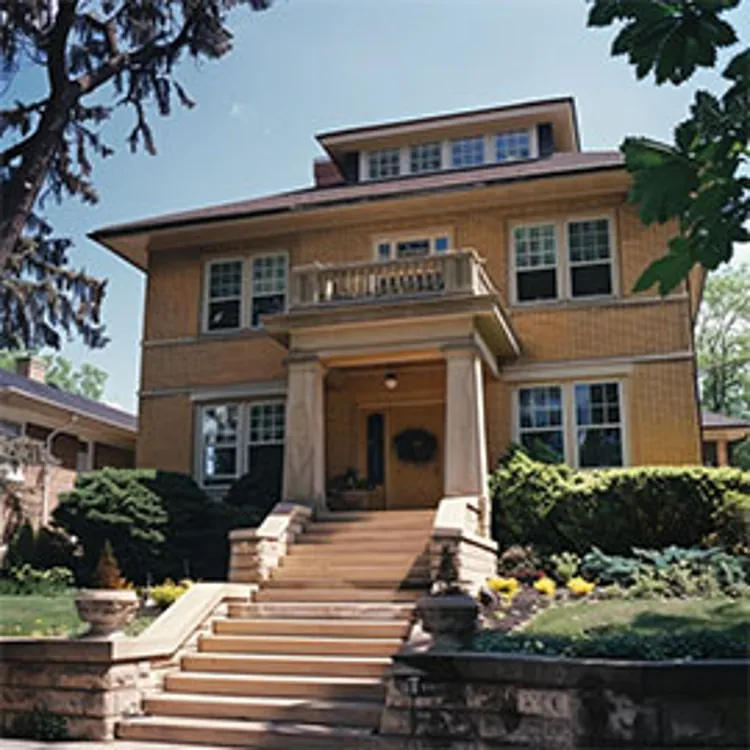 steps leading up to a portico of a house