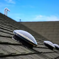 solar tube skylight on asphalt shingle roof