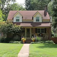 Image showing a house with red roof and two dormer windows