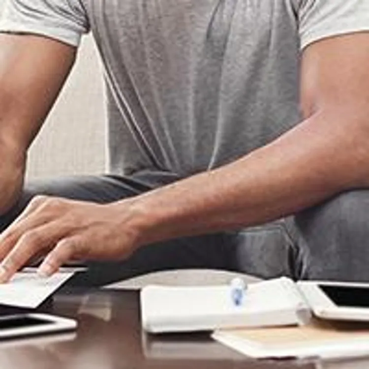 man working on debt