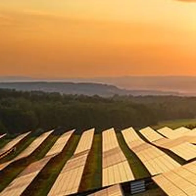 solar panels under the sunset