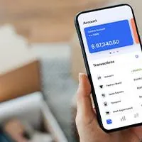 woman checking bank transactions on mobile phone