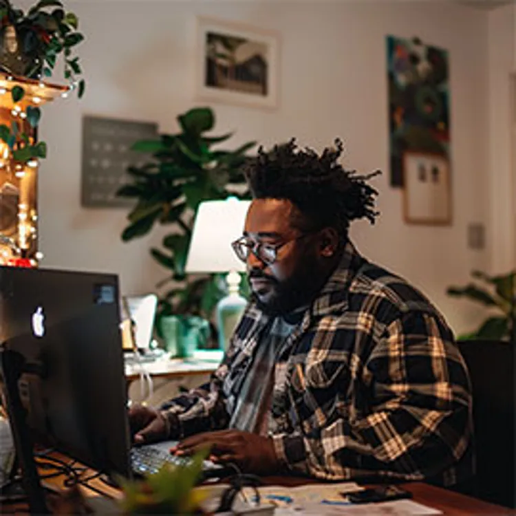 man working on a laptop