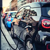 car being refilled with fuel