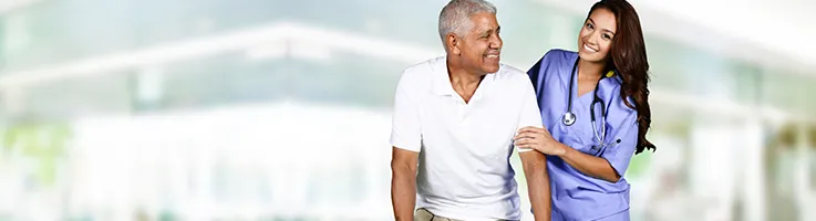 nurse assisting man